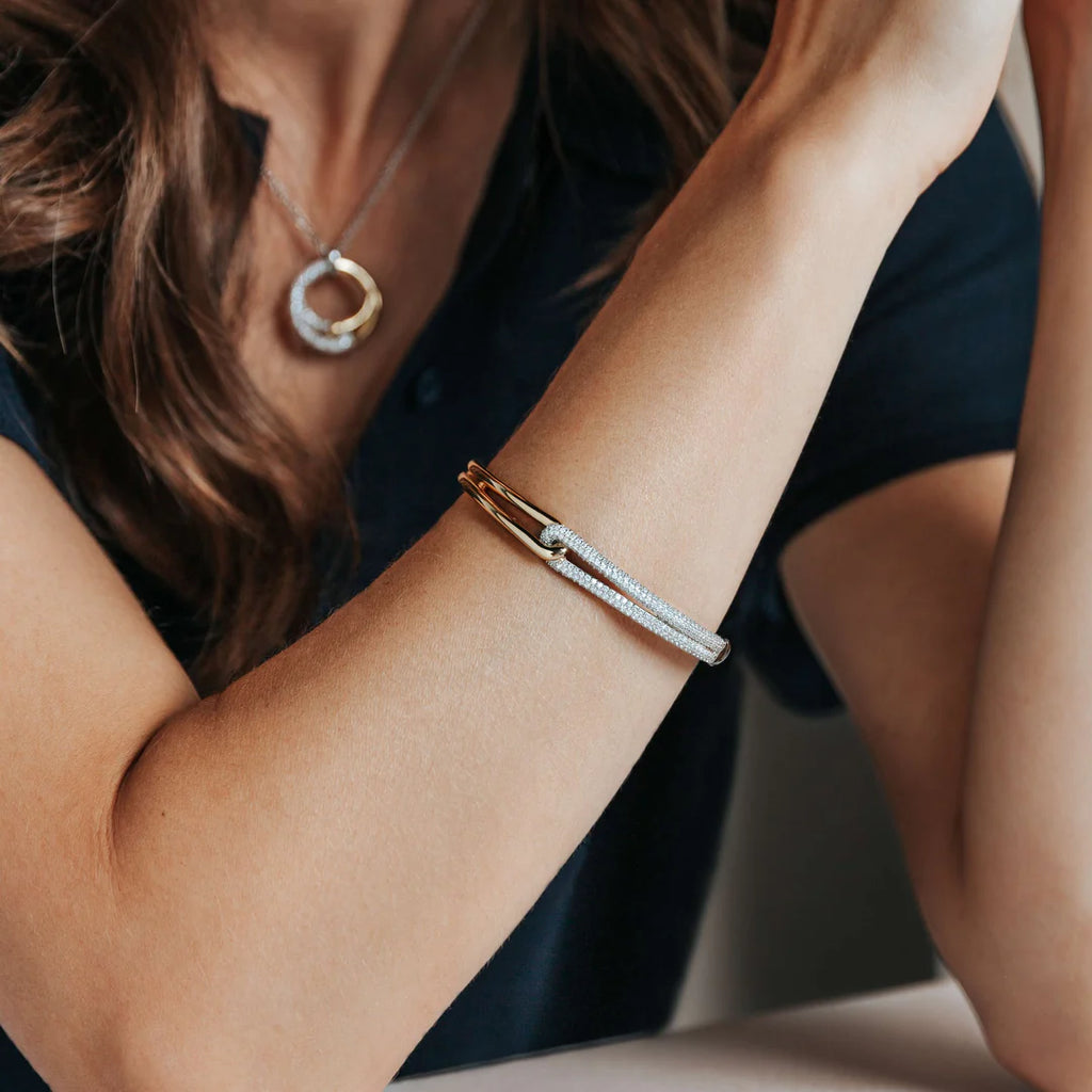 ESCRAVA EM PRATA E PLATINA TI SENTO