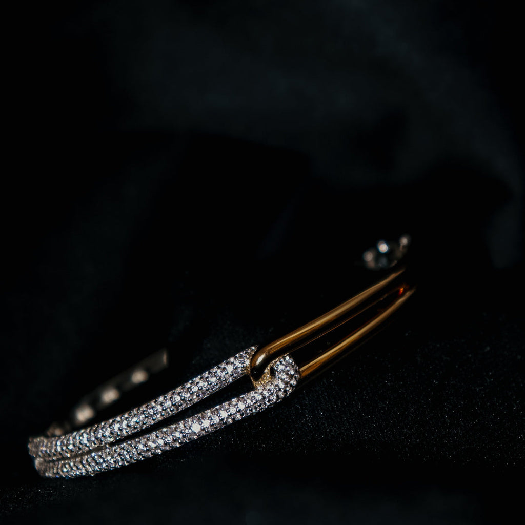 ESCRAVA EM PRATA E PLATINA TI SENTO