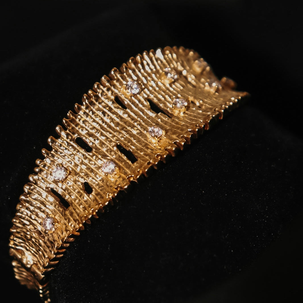 PULSEIRA RÍGIDA EM PRATA DOURADA COM ZIRCÓNIAS MARQUES E GOMES