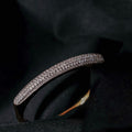 ESCRAVA NUANCE EM PRATA DOURADA GUESS